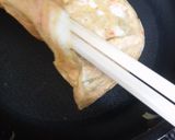 A picture of step 4 of Salmon Pink Tamagoyaki Made with Leftover Sakura Denbu.