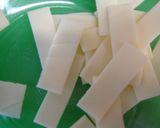 A picture of step 2 of How to Cut Sliced Cheese.