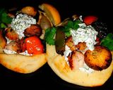 A picture of step 12 of Mike's Chicken Kabobs With Tatziki Sauce & Naan Bread.