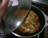 A picture of step 5 of Addictive! Mild Kimchi Jjiage (Korean-style Stew).
