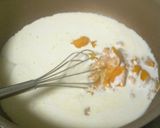 A picture of step 2 of Creamy Melting Triple-layered Mango Pudding.