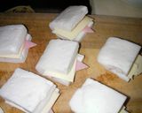 A picture of step 3 of Pan-Fried Hanpen Sandwiches with Ham & Cheese.