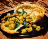 A picture of step 11 of Crispy masala chana katori.