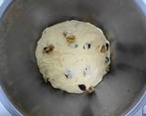 A picture of step 6 of Carrot Bread with Raisins & Walnuts.