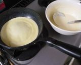 A picture of step 5 of Strawberry, Kiwi, and Peach Mille Crêpes Cake.