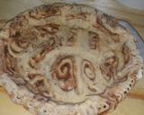 A picture of step 9 of Cinnamon Roll Apple Pie.