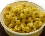 A picture of step 3 of Tortellini Pasta with white sauce.