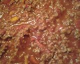 A picture of step 3 of Chili cheese dog with the works casserole.
