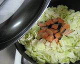 A picture of step 4 of Steamed Salmon and Cabbage with Cheese.