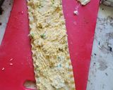 A picture of step 6 of Bourbon barbecue chicken lasagna roll ups.