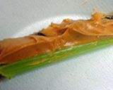 A picture of step 3 of Twist of India celery and peanut butter.