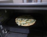 A picture of step 7 of Spinach Alfredo pizza (homemade base).