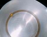A picture of step 1 of Cardamom lemon green tea.