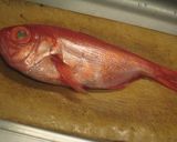 A picture of step 1 of Restaurant-Quality Simmered 'Kinmedai' (Splendid alfonsino) Head and Japanese Leeks.