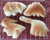 A picture of step 8 of Dinosaur Bread Triceratops.