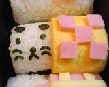 A picture of step 4 of Barrel Animals Character Bento.