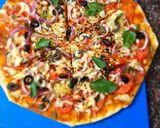 A picture of step 5 of Italian thin crust pizza.