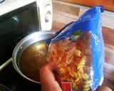 Foto del paso 8 de la receta: Pollo y fideos salteados con caldo de sopa