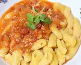 A picture of step 4 of Rich and Cheesy Penne Arrabbiata.