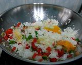 A picture of step 2 of Egg And Bell Pepper Fried Rice.