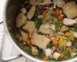 A picture of step 5 of Creamy Chicken and Dumplings with Fresh Field Peas and Veggies.