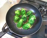 A picture of step 4 of My Family Recipe of Meat-Stuffed Green Peppers.