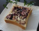 A picture of step 4 of Cream Cheese Banana Nut Bread.