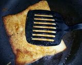 A picture of step 2 of Fried bread with Egg.
