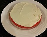 A picture of step 10 of Vanilla Christmas Layer Cake with Creamy Vanilla Buttercream Frosting.