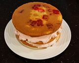 A picture of step 10 of Vanilla Layer Cake with Peppermint Whipped Cream Frosting and Filling.