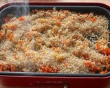 A picture of step 4 of Curry Flavored Paella Cooked on an Electric Griddle.