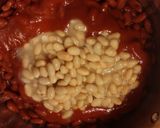 A picture of step 2 of Taisen's chili cheese hot dog w/tots.