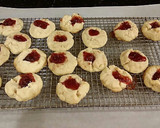 A picture of step 8 of Cherry Thumbprint Cookies.