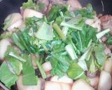 A picture of step 4 of Turnip and Chicken Stir-Fry.
