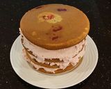 A picture of step 11 of Vanilla Layer Cake with Peppermint Whipped Cream Frosting and Filling.