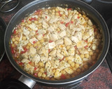 Foto del paso 5 de la receta: Garbanzos compuestos con pechuga de pollo y papas fritas
