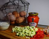 A picture of step 1 of Baked Eggs with Red Pepper Confit.