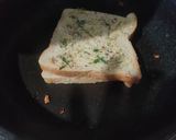 A picture of step 2 of Garlic bread toasted sandwich.