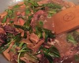 A picture of step 6 of Stir-Fried Baby Squid with Thai Basil.