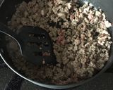 A picture of step 2 of Creamy Sausage Tomato Tortellini.