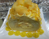 A picture of step 11 of Mango Cake Swiss role.
