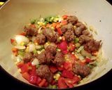 A picture of step 4 of Shrimp and sausage jambalaya.