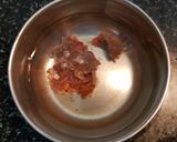 A picture of step 1 of Spicy Brinjal Masala.