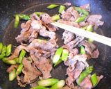 A picture of step 2 of Pork and Asparagus Cheese Grill.