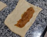 Foto del paso 7 de la receta: Chuchos rellenos de toffee de plátano y puntas de chocolate