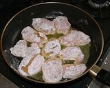 A picture of step 6 of Italian Sautéed Chicken Breasts in Tomato Sauce.
