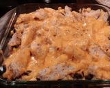 A picture of step 5 of Cheesy chicken and rice.