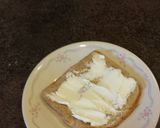A picture of step 2 of kale,tomato and cream cheese breakfast sandwich.