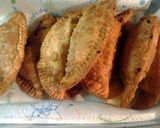 A picture of step 5 of four meat empanadas.