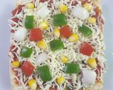 चीज़ गार्लिक ब्रेड पिज़्ज़ा (Cheese garlic bread pizza recipe in Hindi) रेसिपी चरण 6 फोटो